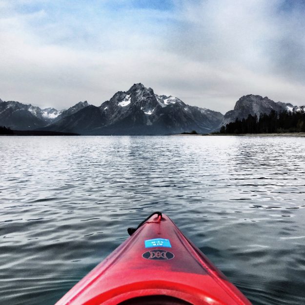 Road Trip Itinerary Through Wyoming, kayak jackson lake